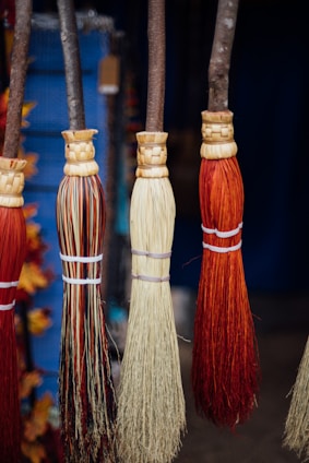 Workshop scene showing artisans crafting brushes and brooms by hand.