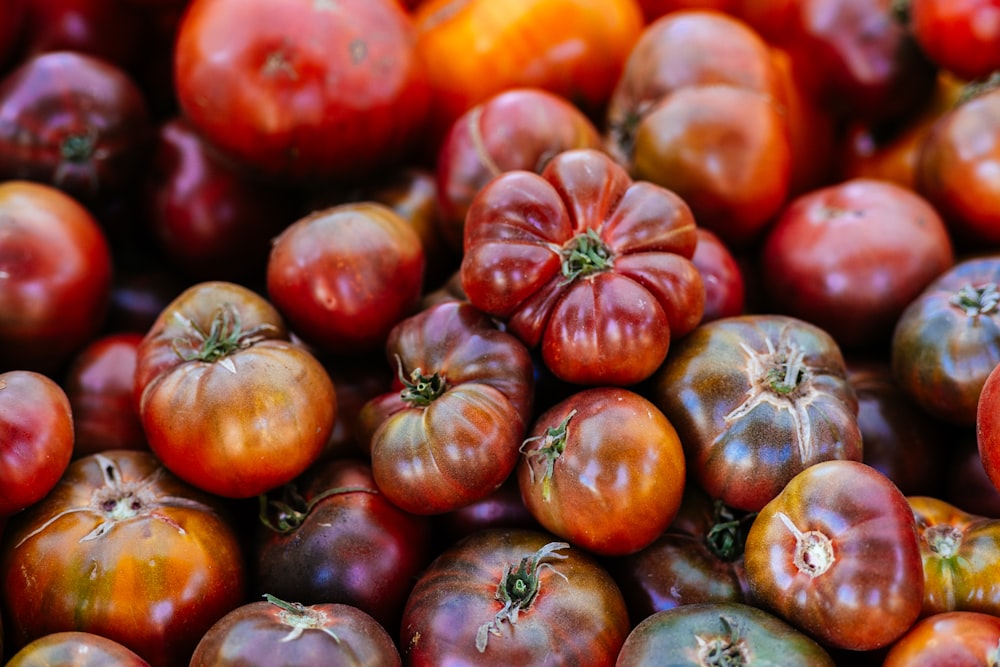 a close up of a bunch of tomatoes