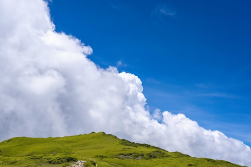 A vibrant landscape showcasing a scenic travel destination with clear blue skies.