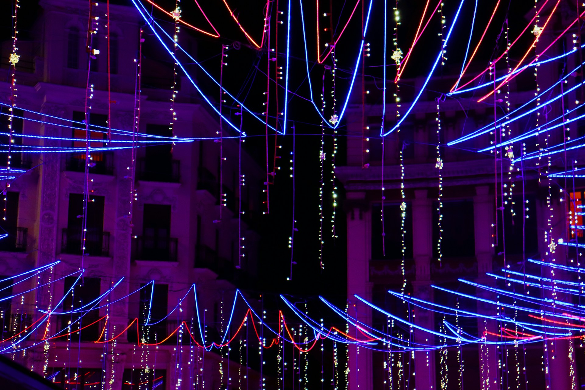 woman wearing yellow long-sleeved dress under white clouds and blue sky during daytime