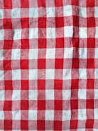 a red and white checkered table cloth