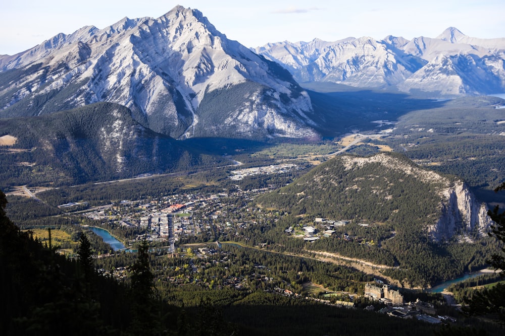 a view of a valley and mountains from a high point of view