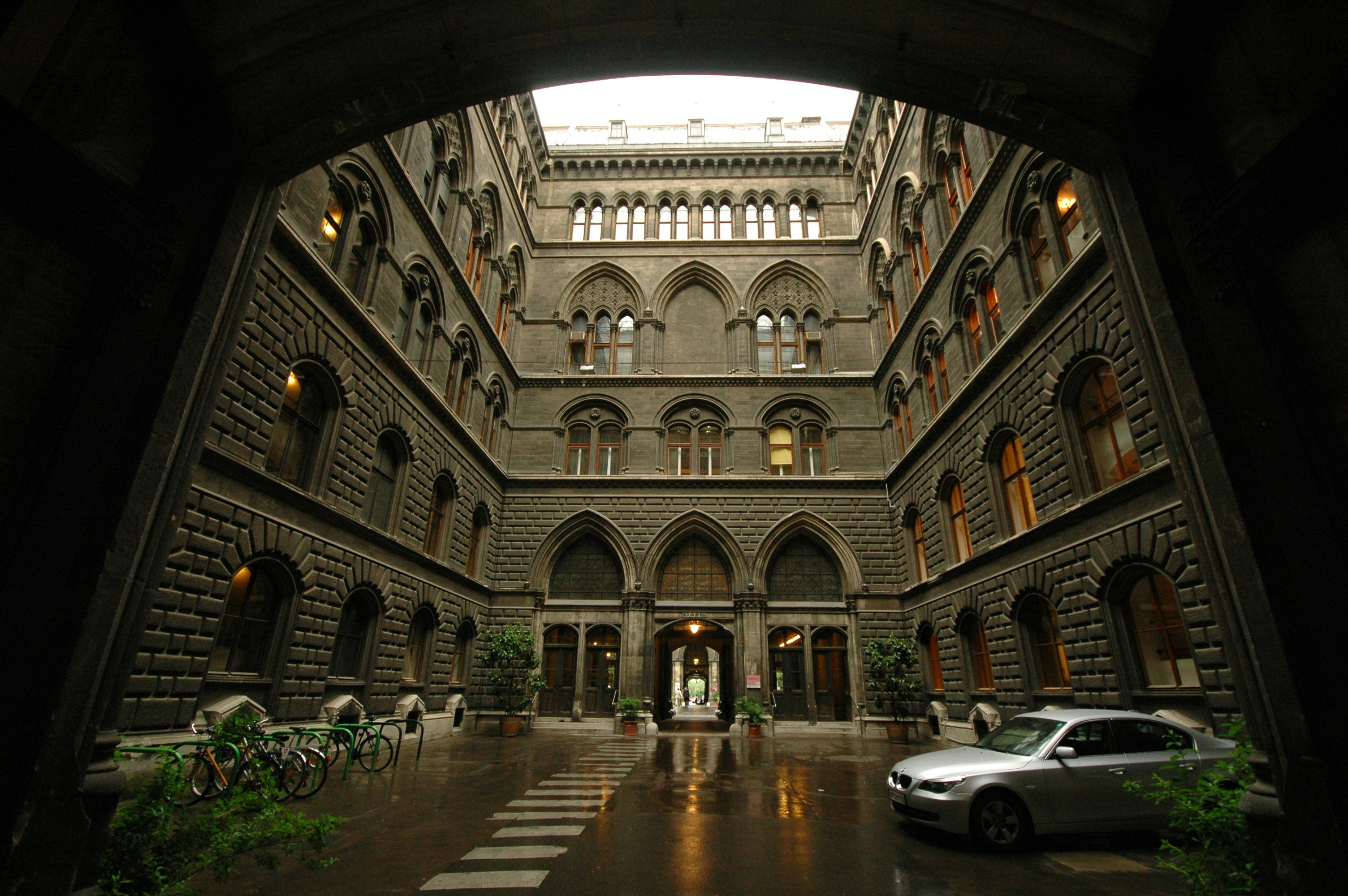 a car is parked in a large building