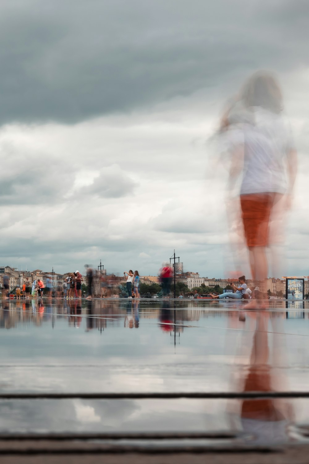 a blurry photo of a person standing on a skateboard