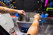 A technician using advanced cleaning equipment.