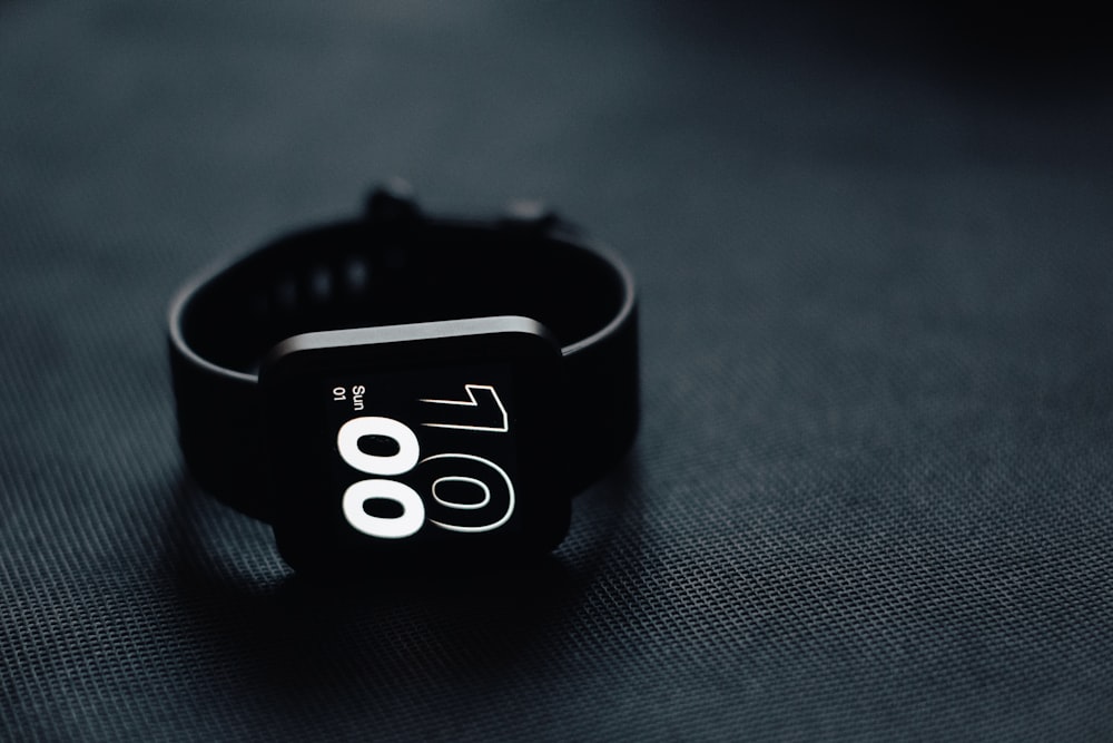 a close up of a watch on a table