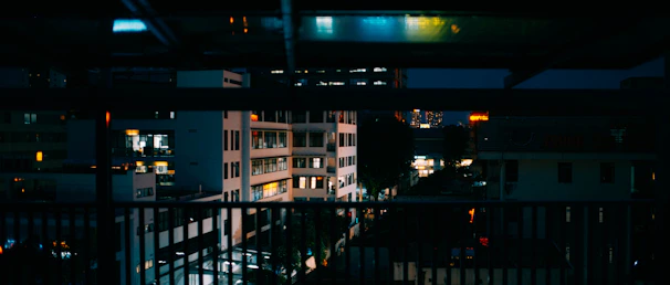 Nighttime view of the Atlanta skyline from a renovated rental property balcony.