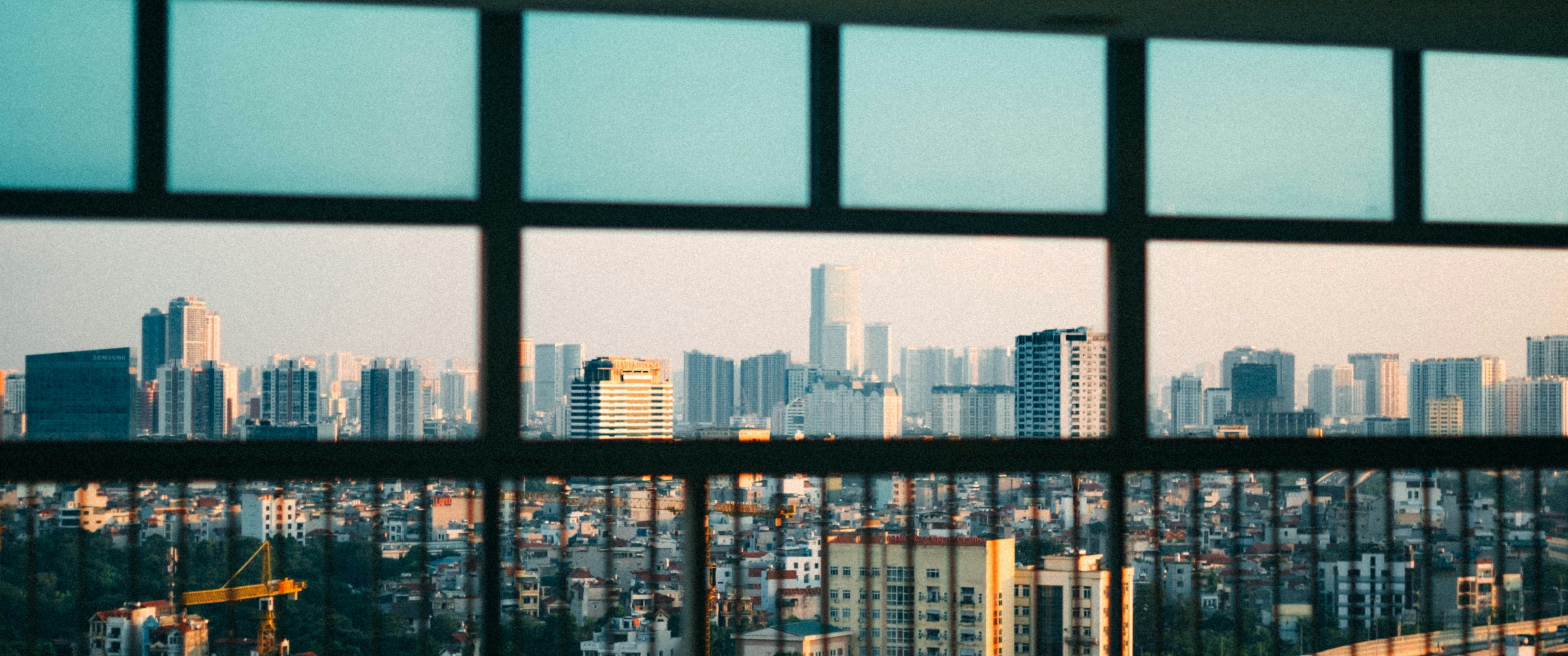 a view of a city through a window, 