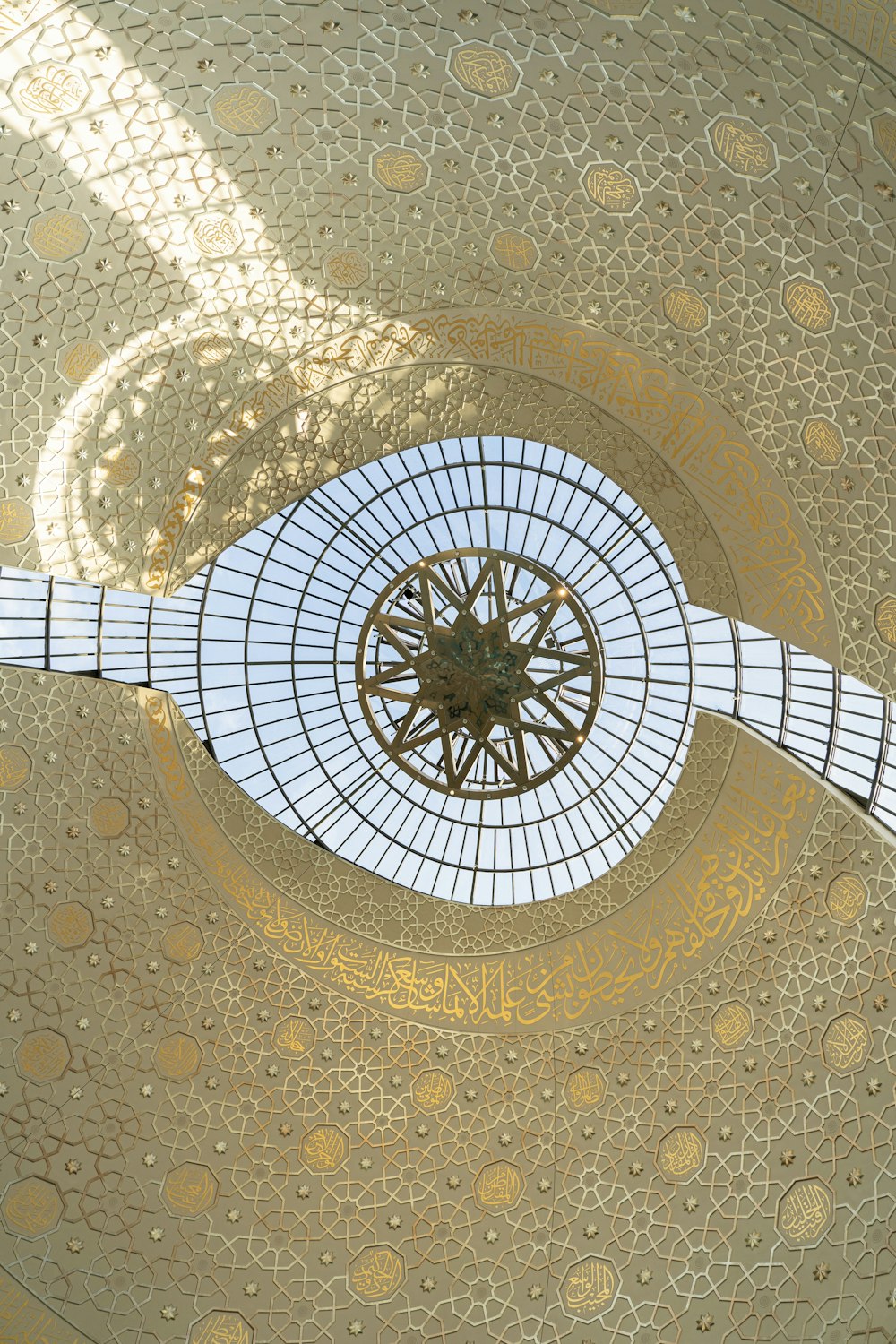 a ceiling with a clock on it in a building