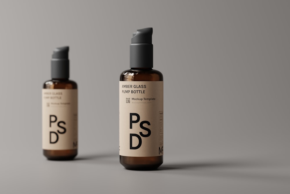 two bottles of psd on a grey background