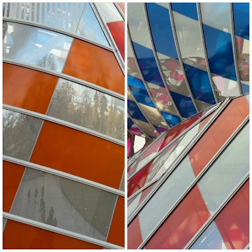 The image features two sections with geometric panels. The left side displays large, orange and beige reflective panels with abstract reflections of trees and structures. The right side contains a vibrant mix of red, blue, and pink panels, creating a dynamic visual pattern.