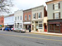 a row of buildings on a city street
