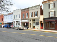 a row of buildings on a city street