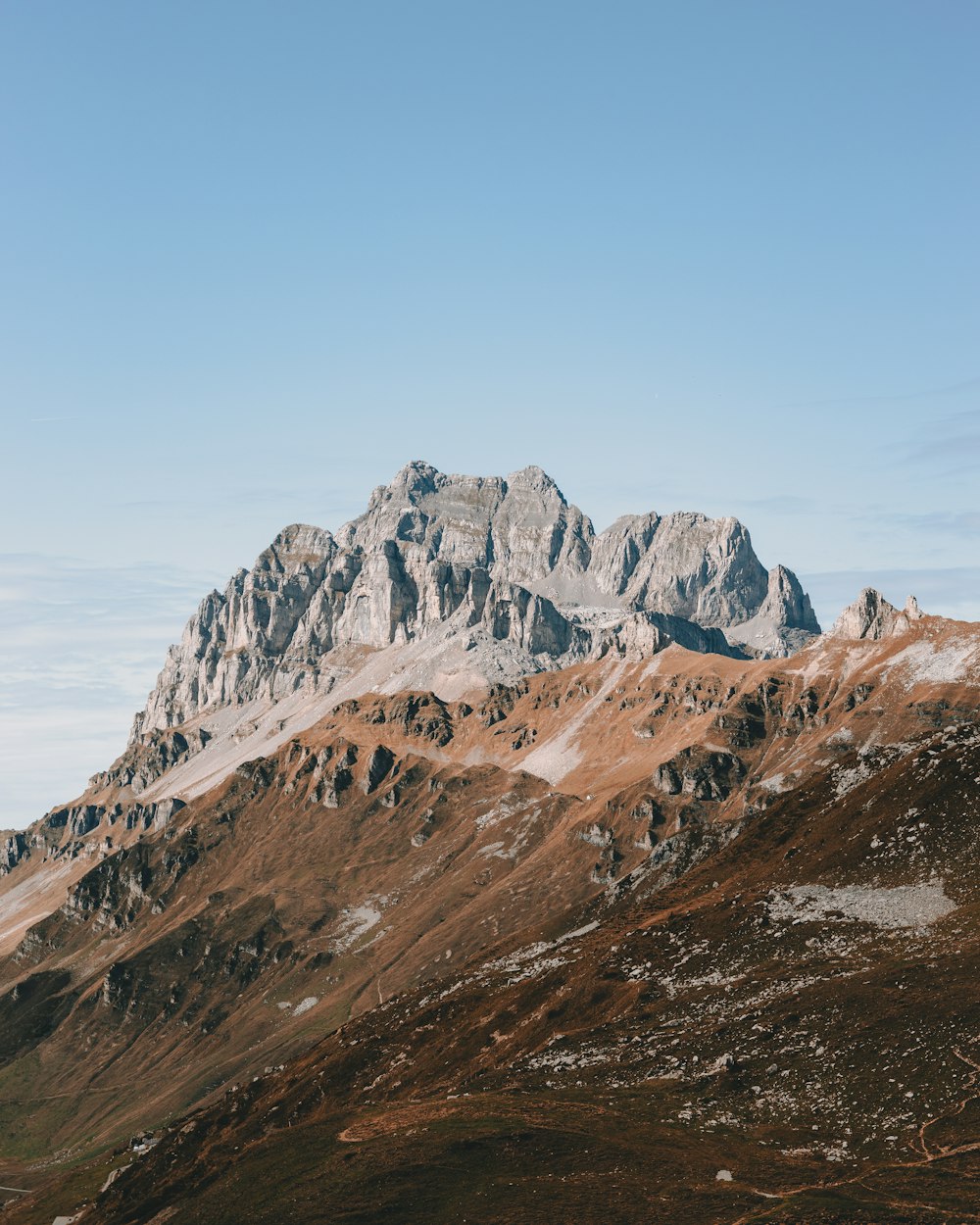 a mountain range with snow on the top of it