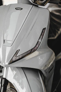 A sleek automatic scooter ready for a smooth ride through scenic mountain roads.