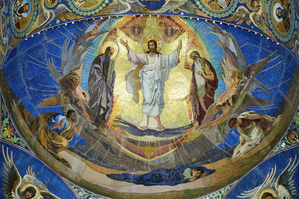 A luminous depiction of Jesus Christ blessing with outstretched hands, radiating warmth.