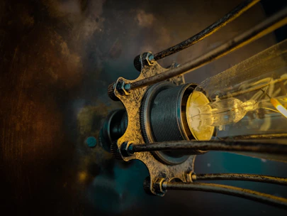 A close-up of an industrial cage light glowing softly in a cozy room