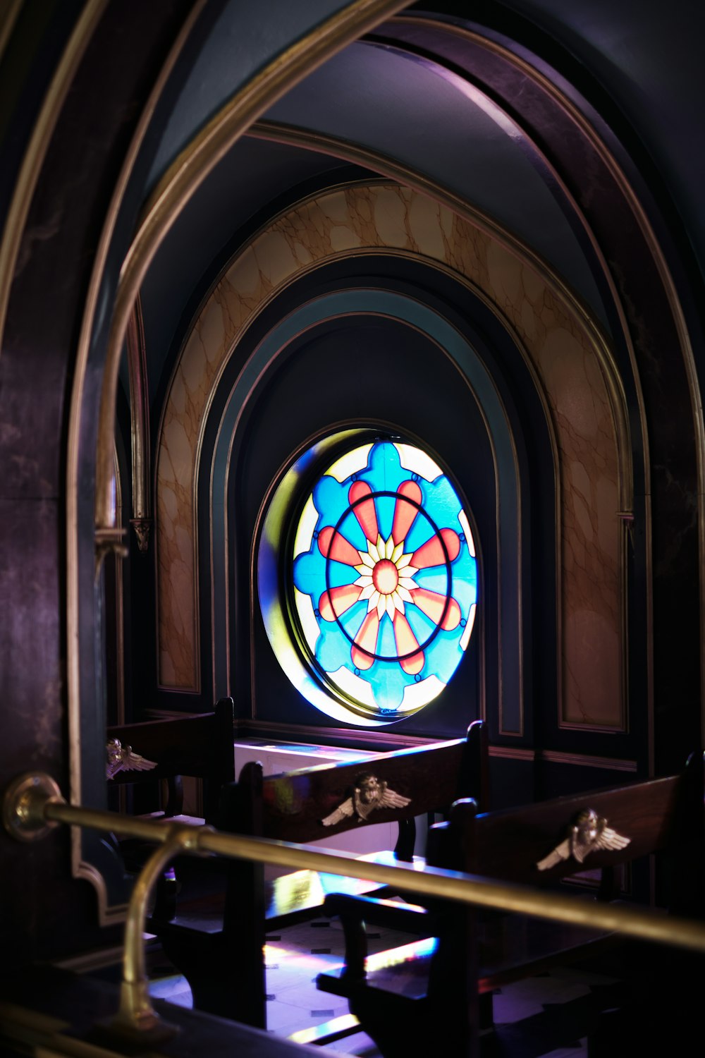 a stained glass window inside of a church