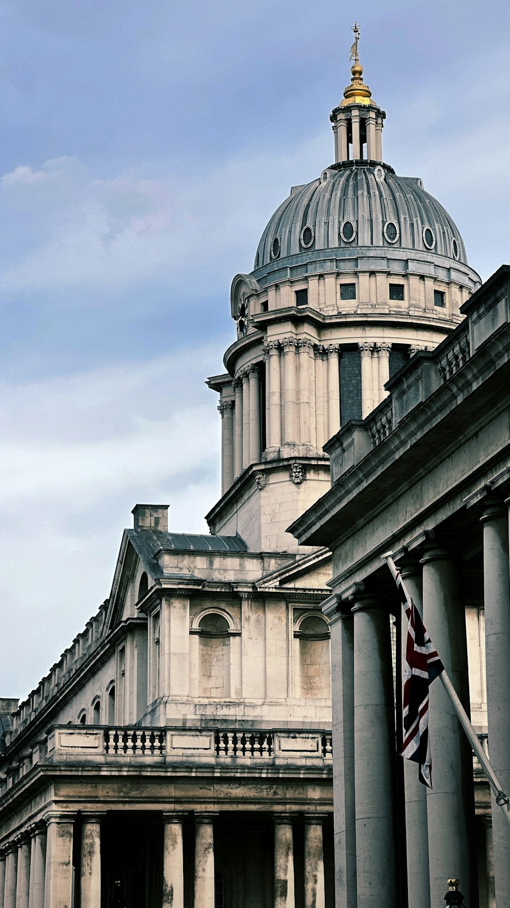 a building with columns and a dome on top