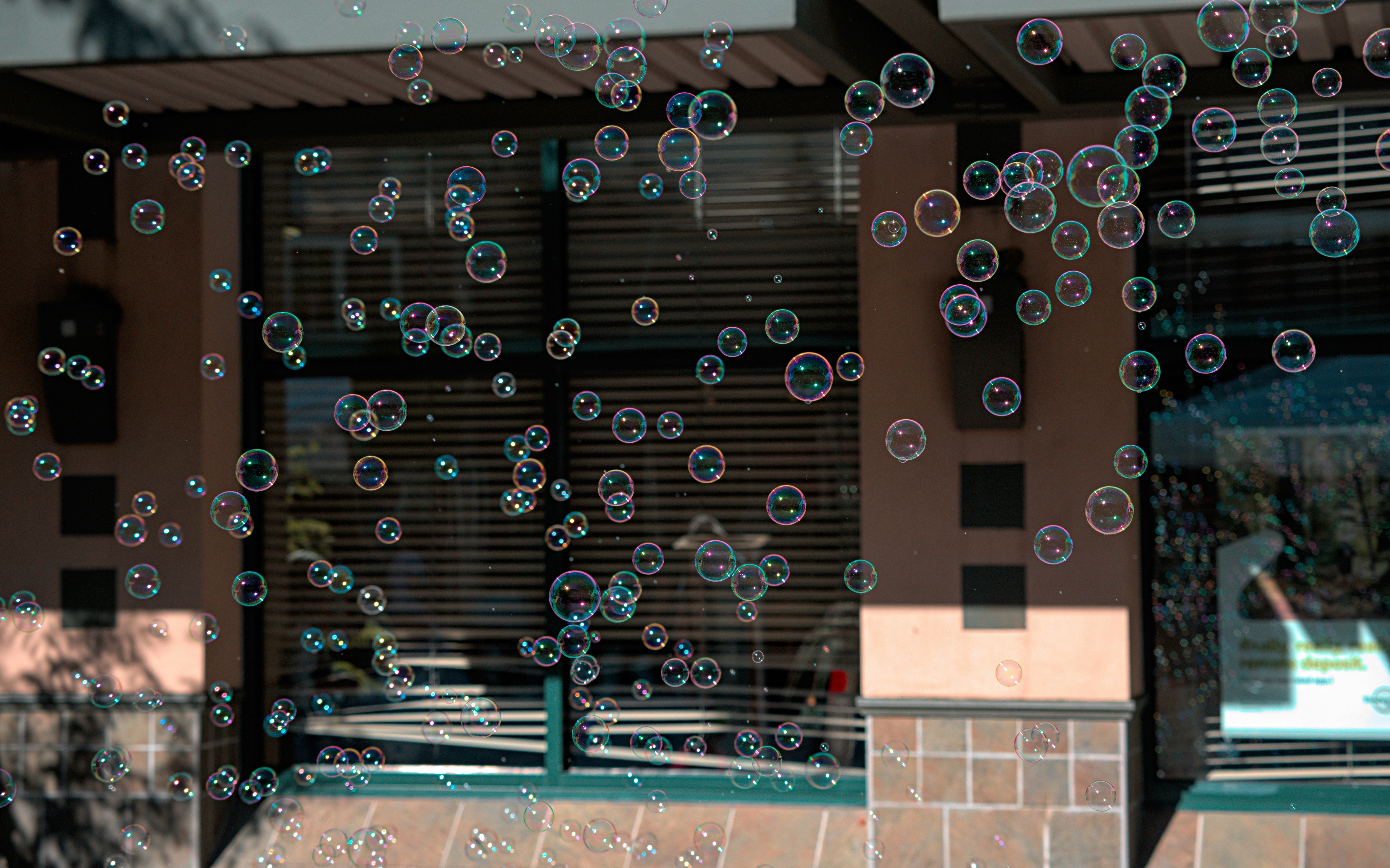 a bunch of bubbles that are floating in the air