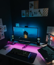 Modern computer setup with glowing peripherals against a backdrop of a world map.