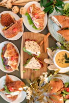 A colorful display of assorted sandwiches and snacks ready to be served.