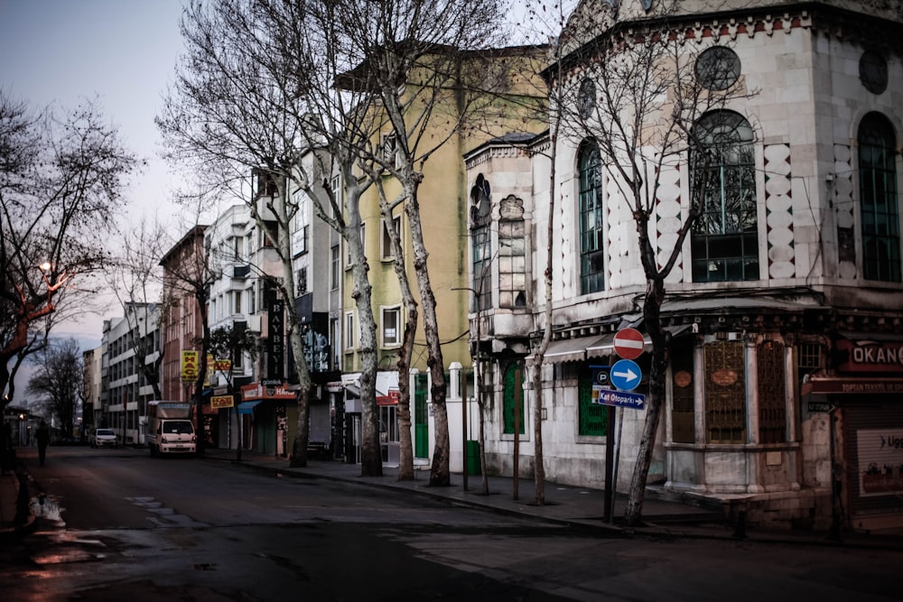 a row of buildings on a city street