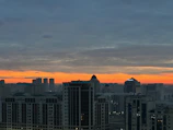 A panoramic view of Baghdad's skyline at dusk highlighting modern developments.