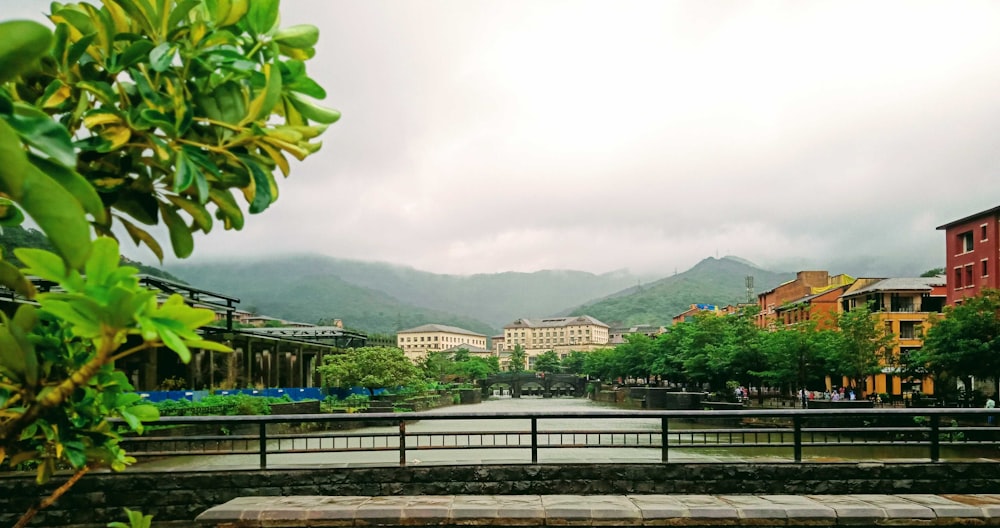 a bridge over a river in a small town