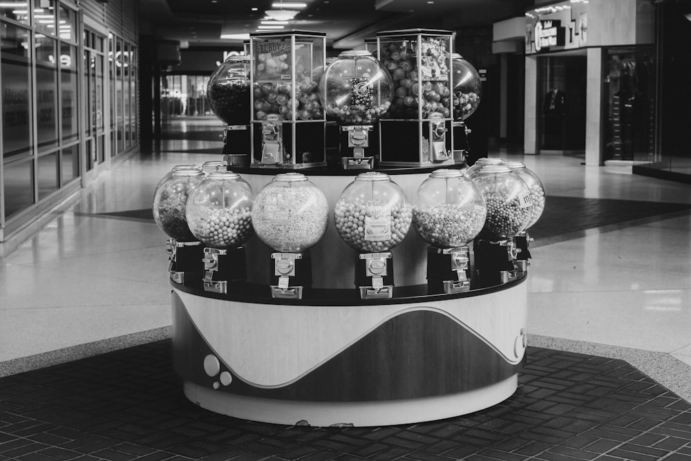 a black and white photo of a display in a mall
