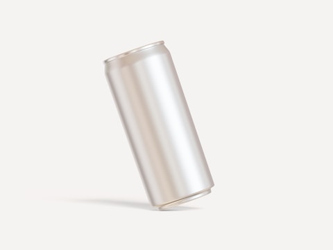 A plain, metallic cylindrical can is positioned on a light background, creating a minimalist and clean aesthetic.