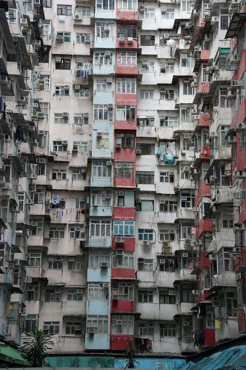 a very tall building with lots of windows and balconies