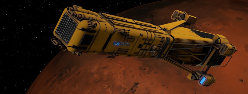 A yellow, futuristic spacecraft with detailed mechanical components is flying above the reddish surface of a planet, possibly Mars. The background is a starry space scene.