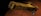 Close-up of a futuristic spacecraft hovering above a mysterious alien planet.