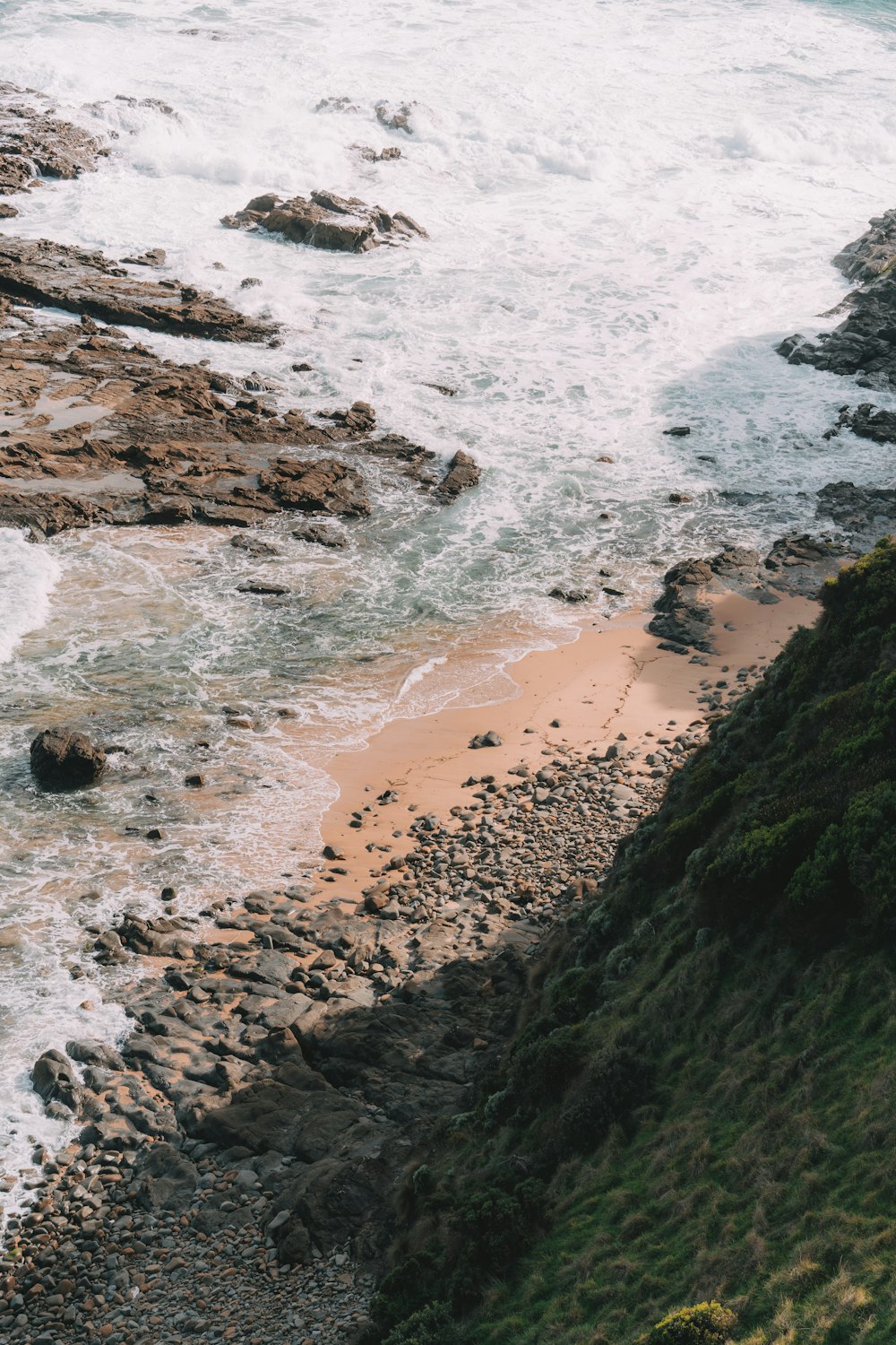 a view of the ocean from a cliff