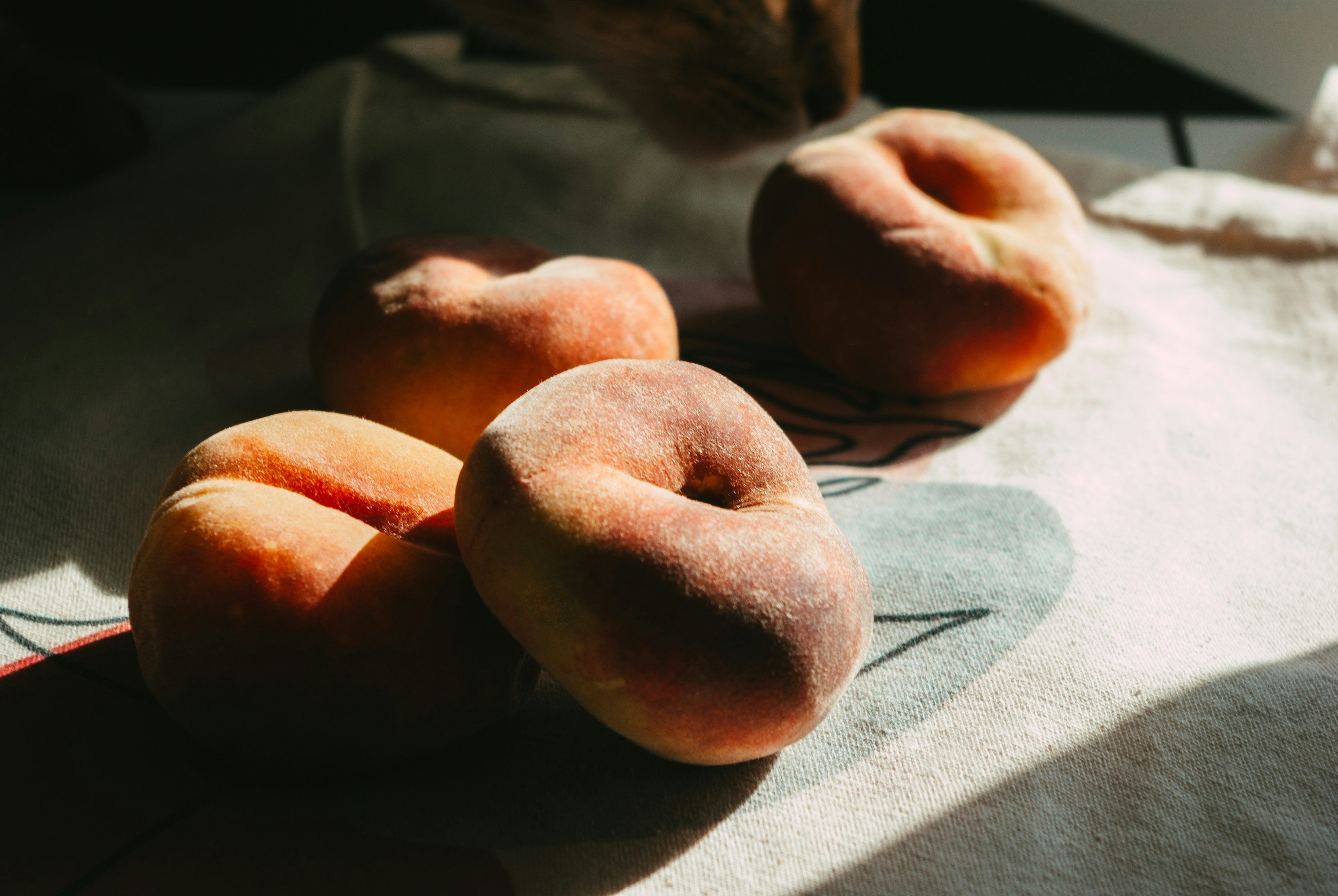 a couple of doughnuts sitting on top of a table