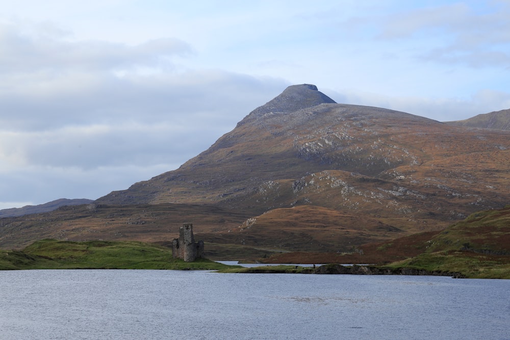 a mountain with a lake in front of it