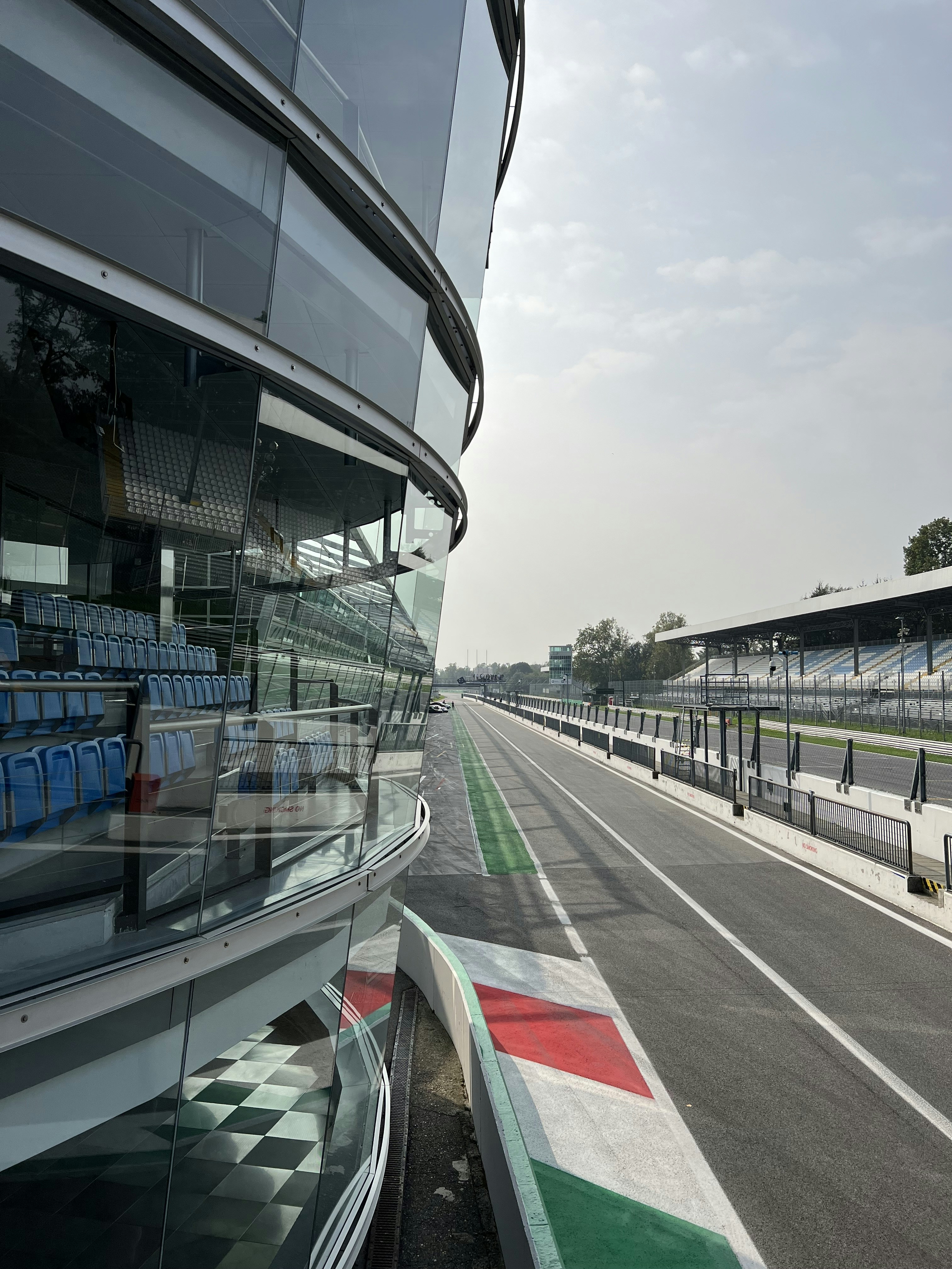 a view of a race track from the side of a building