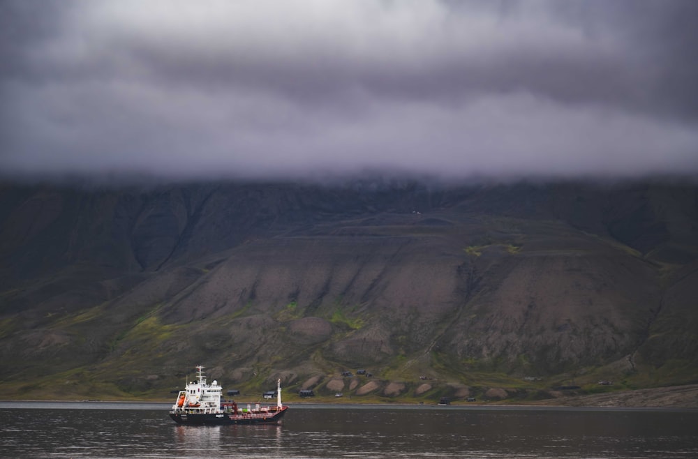 a large boat floating on top of a large body of water