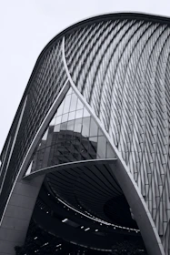 A completed innovative building exterior showcasing modern design and engineering finesse.