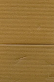 Close-up of corrugated cardboard sheets highlighting texture and strength.