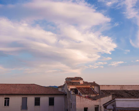 A serene photo of Benidorm's old town streets bathed in morning light.