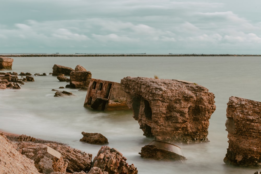 a large body of water surrounded by rocks