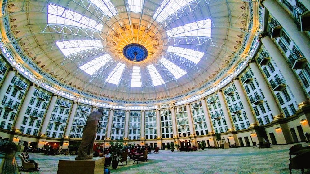 the inside of a large building with a domed ceiling