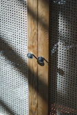 Close-up of a finely crafted wooden cabinet with smooth edges.