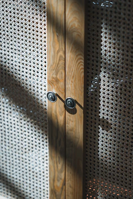 Close-up of a finely crafted wooden cabinet with smooth edges.