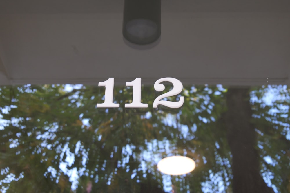 a close up of the numbers on a glass door