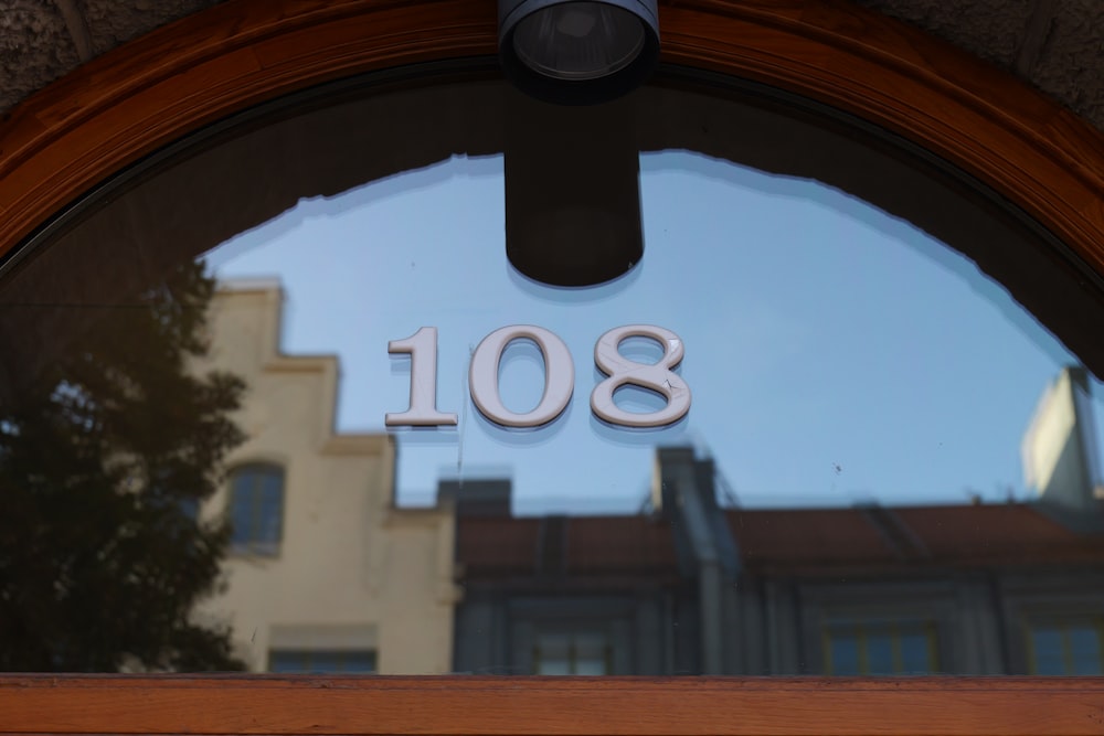 a close up of a door with a building in the background