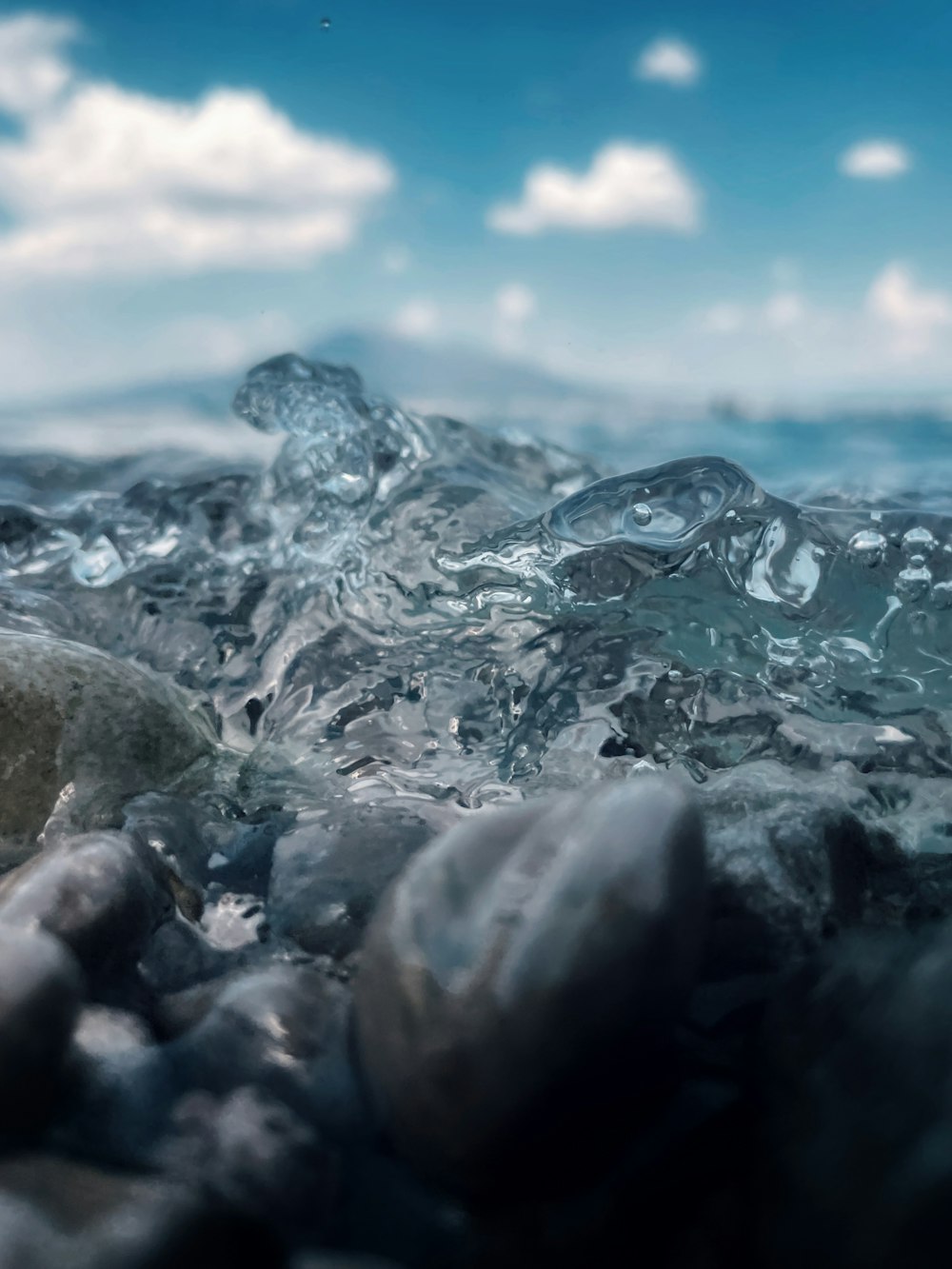 a bunch of rocks that are in the water