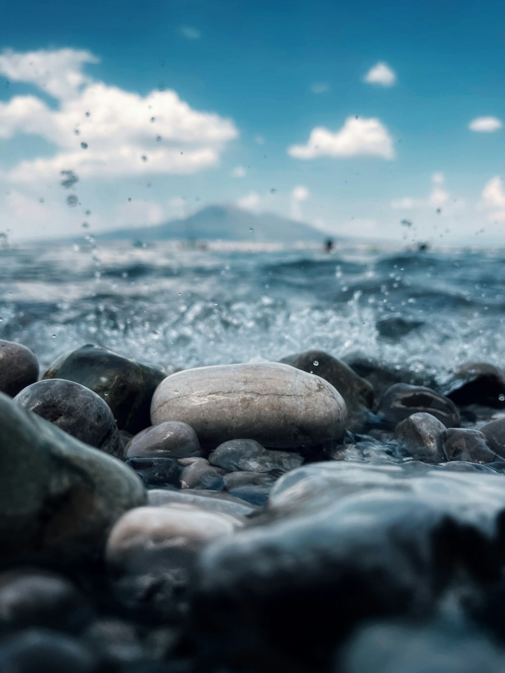 a bunch of rocks that are in the water